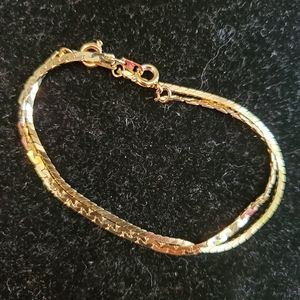 Two vintage 1980s goldtone bracelets